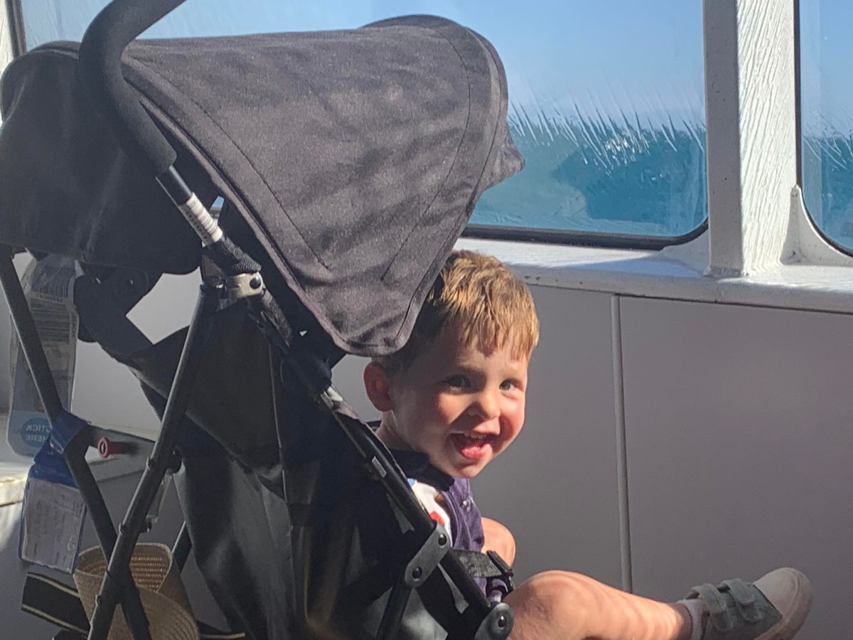 charlie on boat with water hitting window