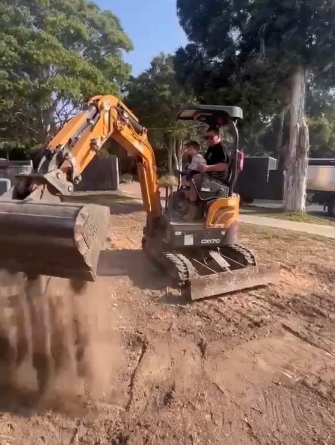 charlie on digger with poppy