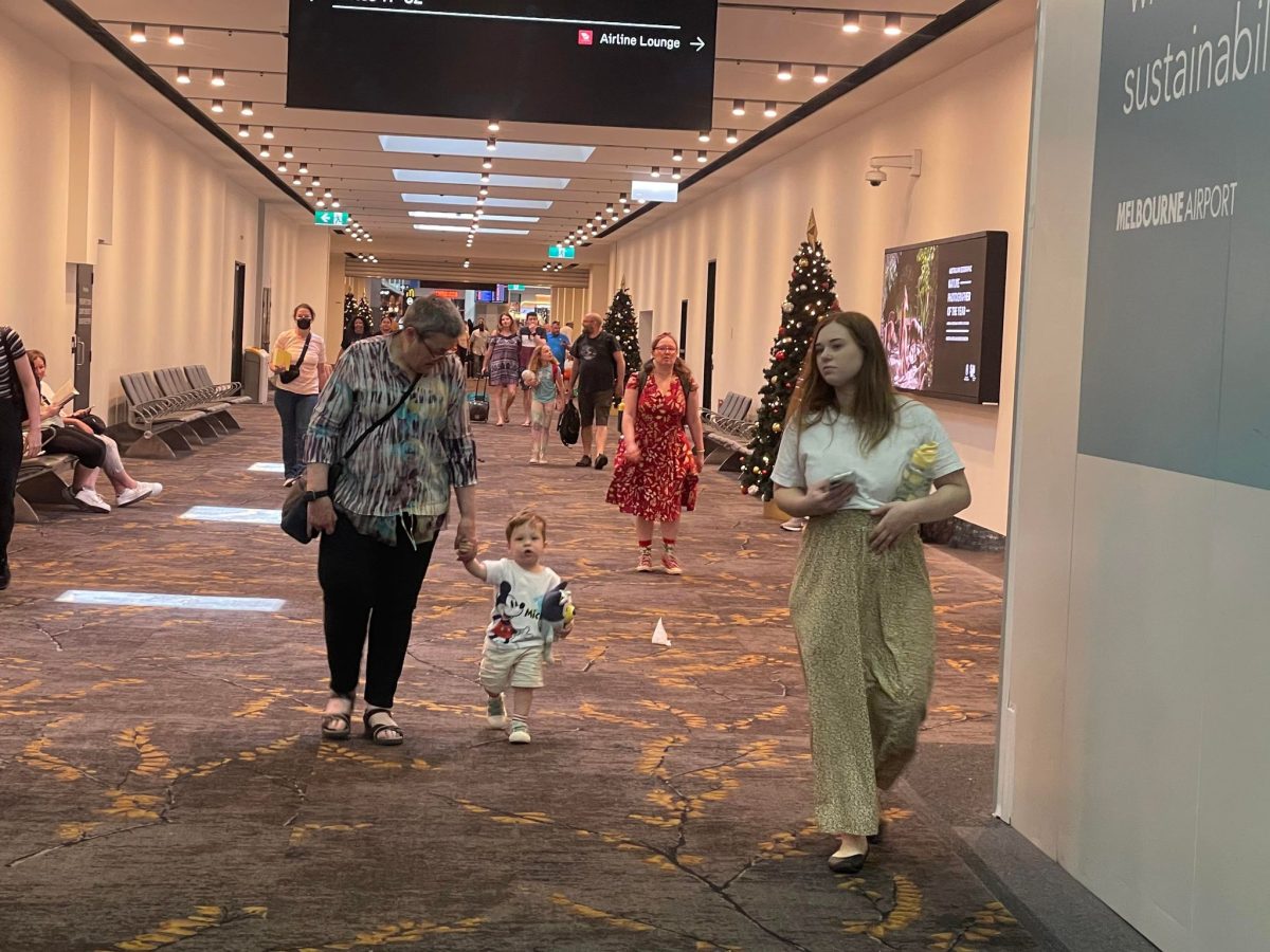 charlie walking through melbourne airport