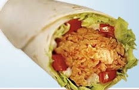 Old KFC Twister wrap filled with crispy chicken, lettuce and tomato in a tortilla